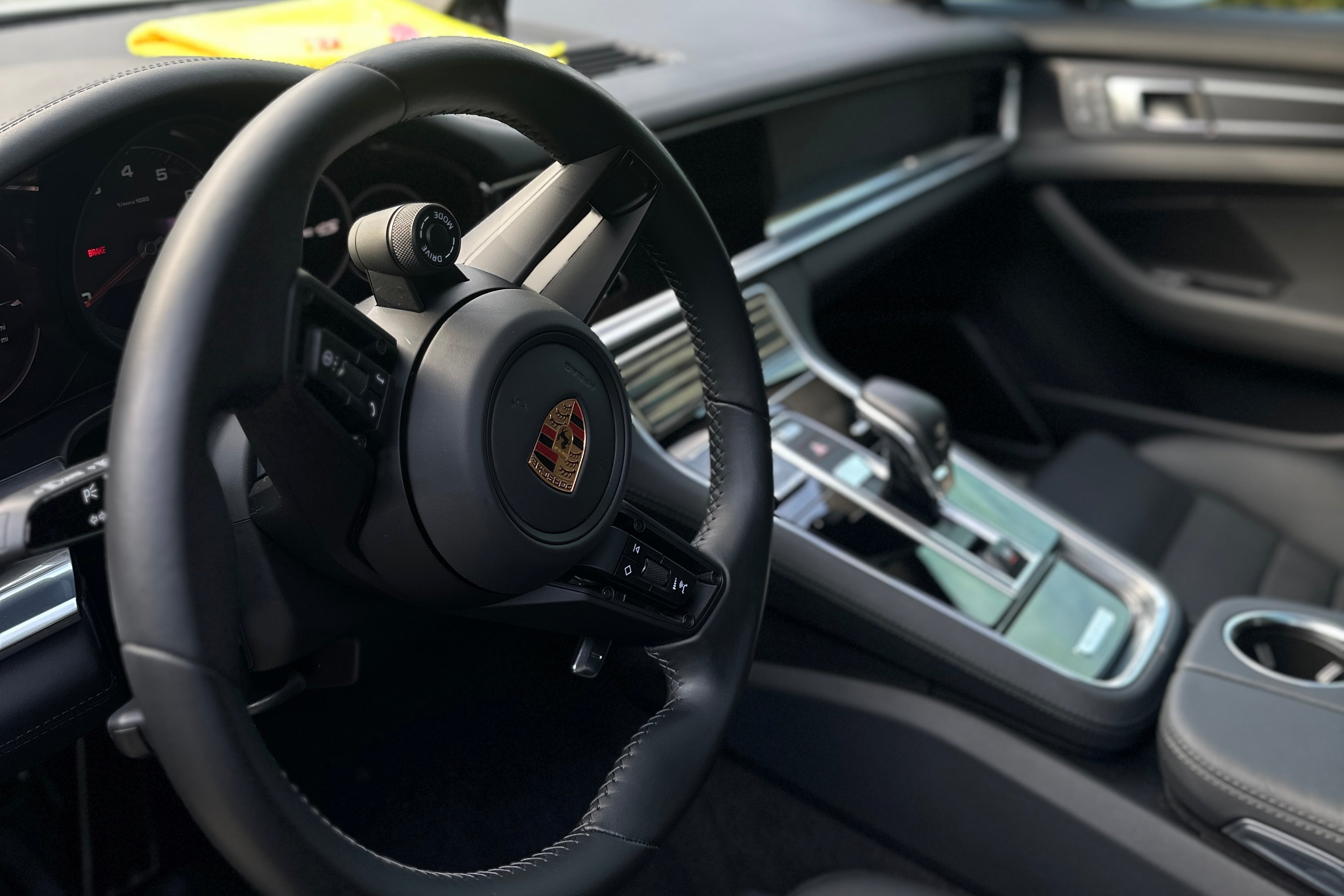 Freshly detailed car interior with steering wheel and dashboard.